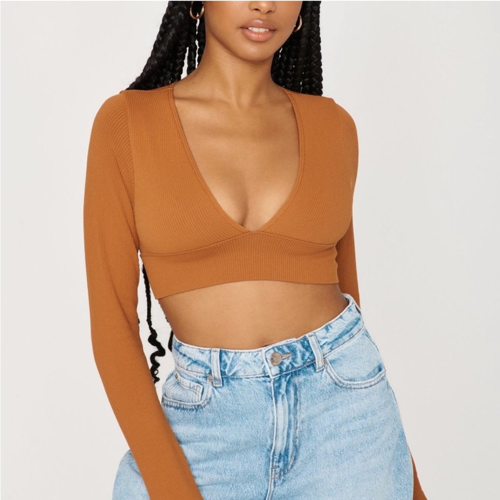 Garage ribbed deep v neck.  Size lg.  but is fitted.